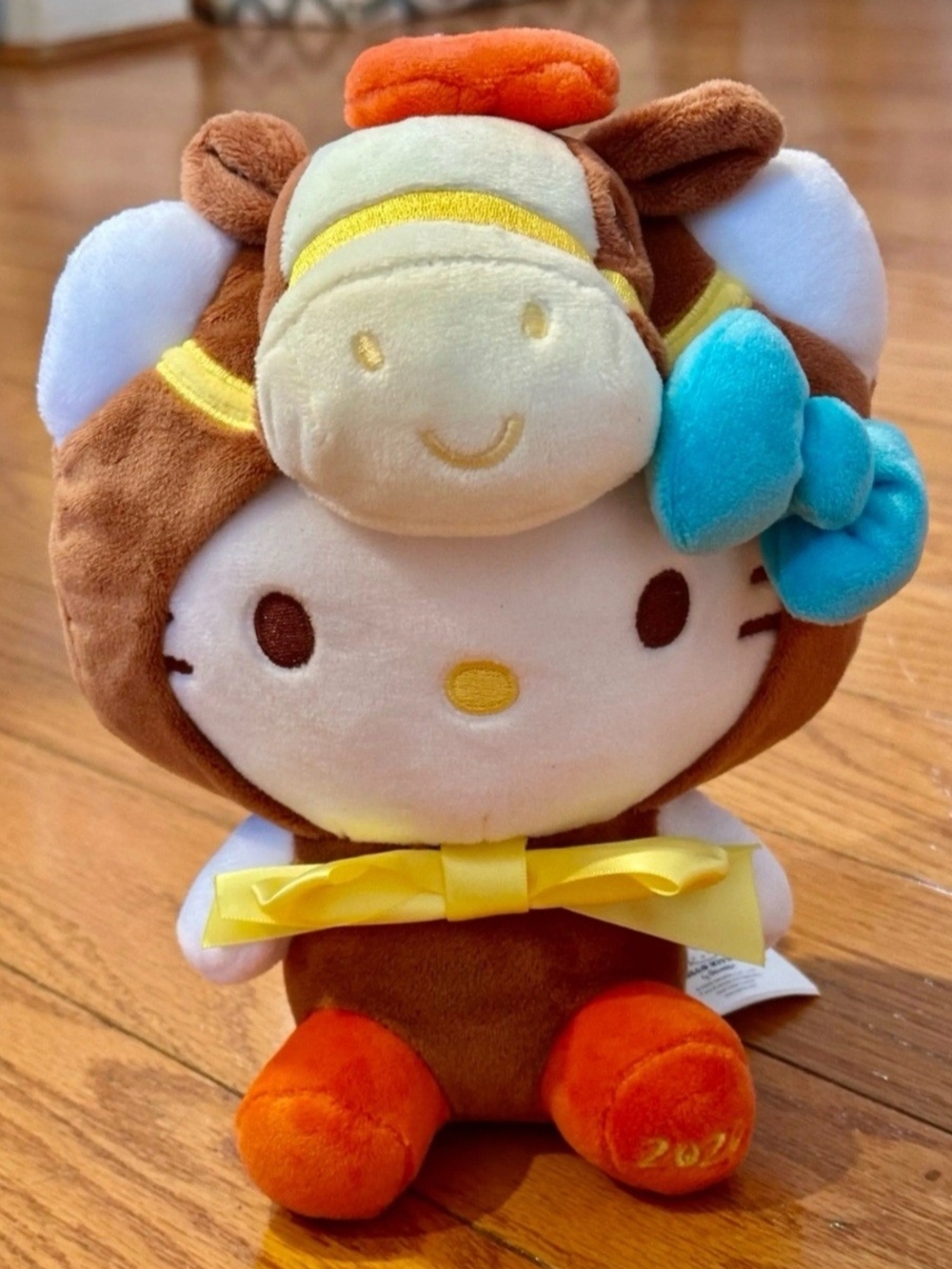 Sanrio Hello Kitty Plush in Brown, White and Teal with Orange Accents ..2026